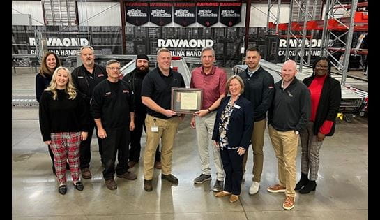 Carolina Handling associates accept the veteran friendly employer award from representatives of the SC Department of Veterans Affairs.