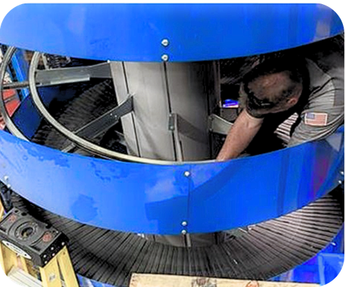 Tech working on spiral conveyor