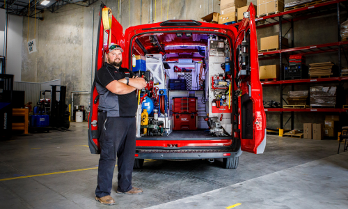 Carolina Handling red van and technician.