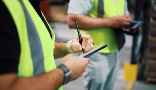 People taking notes warehouse 