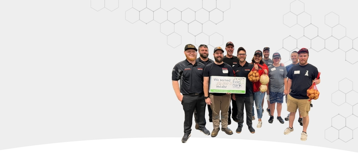 Carolina Handling associates who packed meals for homeless.