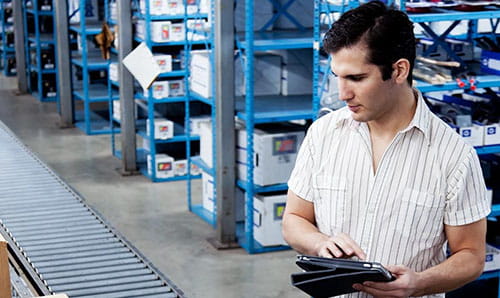 conveyor maintenance technician maintaining a conveyor