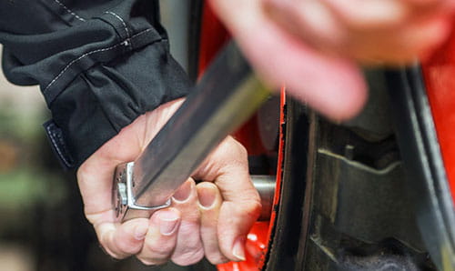 forklift maintenance technician maintaining a forklift