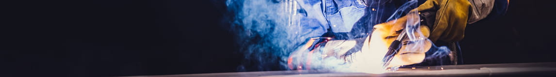 Raymond employee welding