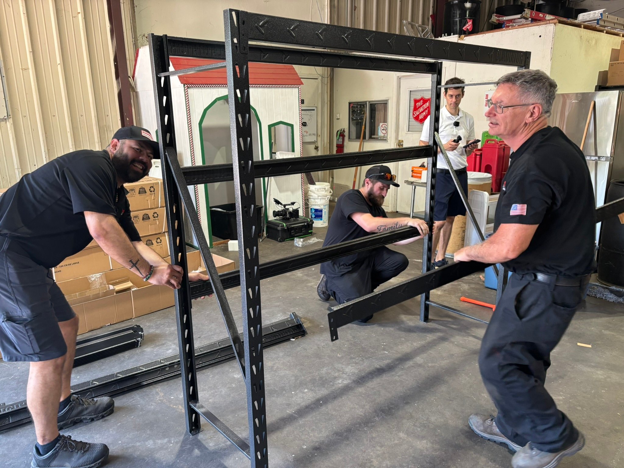 Carolina Handling associated assembled new, standardized racks at the food pantry 