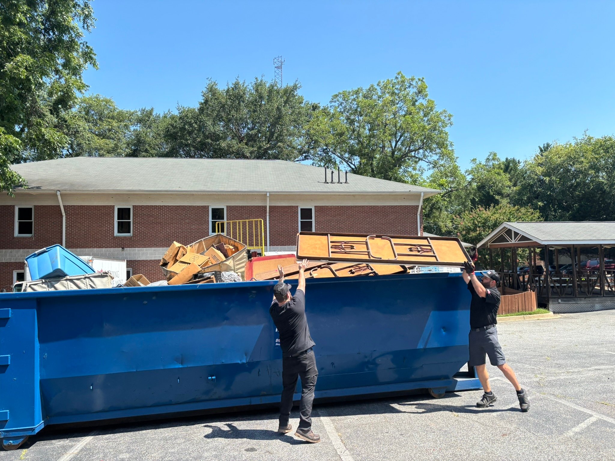  Carolina Handling associates spent an afternoon assisting Salvation Army staff in removing and disposing of unnecessary materials 